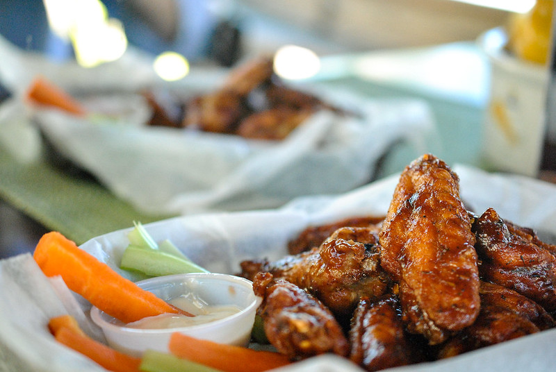 Plate of buffalo wings and fries