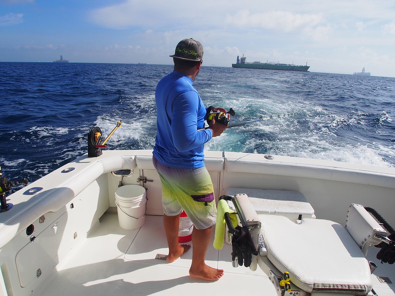 Fishing from the back of a boat in Aruba